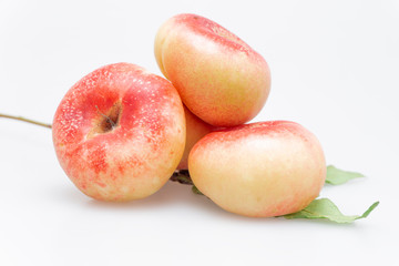Peaches on a white background..