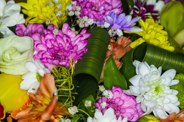 Beautiful gift bouquet of various colorful decorative summer flowers