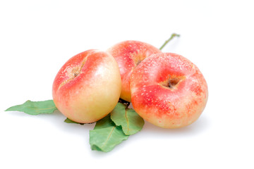 Peaches on a white background..