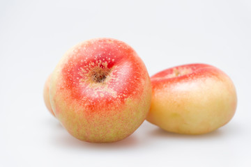 Peaches on a white background..