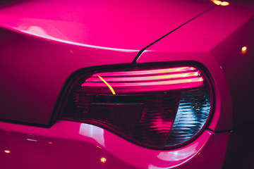 Close up projector Taillight of the modern and elegant car, automotive part concept.