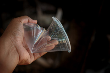 Hand Hold Show Recyclable Plastic for recycling concept reuse.