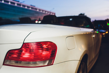 Obraz na płótnie Canvas Close up projector Taillight of the modern and elegant car, automotive part concept.