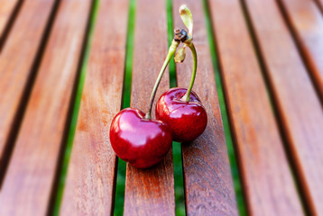 cherry on wooden background