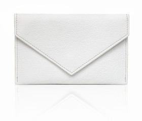 White luxury envelope-shaped wallet, made from goatskin. Isolated on white background with shadow reflection. Small, flat leather case for personal items. Pocket-sized small bag. White goatskin purse. - obrazy, fototapety, plakaty