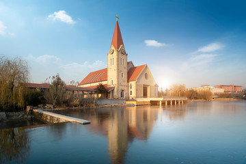 Obraz premium Christian Church by the River..