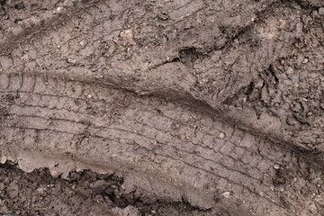 Muddy brown road texture. Slobber desktop image. Mud on driveway.