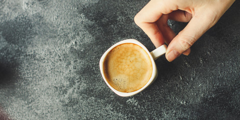 coffee freshly brewed in a white cup serving of beverage (coffee grain). food. top.copy save