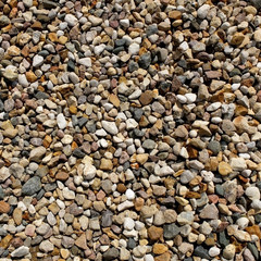 Texture of gravel stones on country road