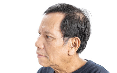 Obraz premium old wrinkled asian man portrait isolated on white background
