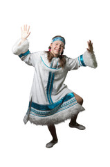 Teenager girl dancing in national costume of the peoples of the North. Isolated. Studio photography.