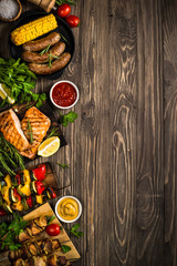 Barbeque dish - Grilled meat, fish, sausages and vegetables.