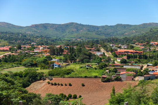 Panoramic view of picturesque village in a valley in the midst of hills and mountains. Samaipata, Bolivia