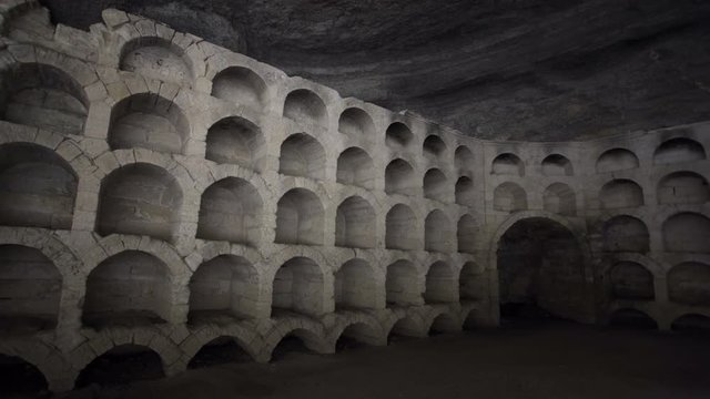 Ancient wine cellar in a rocky grotto