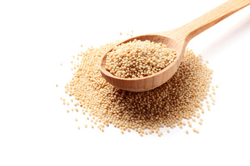 Amaranth in wooden spoon isolated on white background