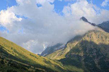 Panorama view on mountains scene in national park of Dombay, Caucasus