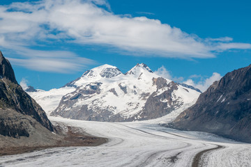 Fototapeta premium Panorama of mountains scene, walk through the great Aletsch Glacier