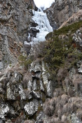 Fototapeta na wymiar Top of Gveleti Large Waterfall with Foreground Landmass, Caucasus Mountains, Georgia
