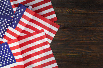 Independence day. Usa flag on dark wooden background