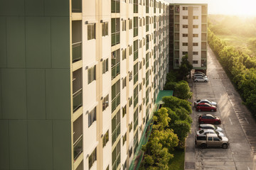 Architecture of Apartment Exterior Building at Sunset, Residential Condominium Real Estate in Urban...
