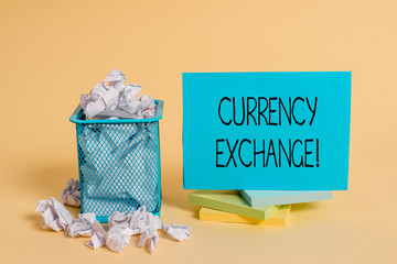 Writing note showing Currency Exchange. Business concept for Process of changing one currency into...