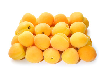 Fototapeta na wymiar Ripe juicy orange apricots isolated on white background.