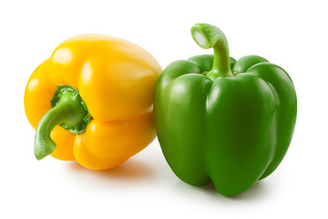 Green and yellow peppers isolated on white