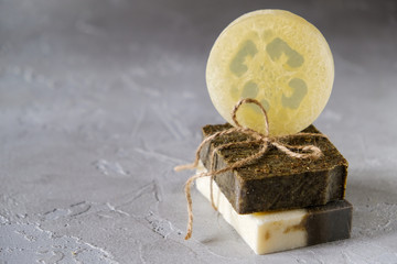 Bars of natural soap with dried herbs and soap with loofah. Natural Herbal Products. Spa cosmetics