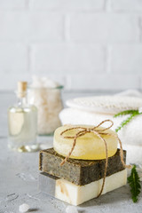 Natural cosmetic oil and natural handmade soap with loofah . Healthy skin care. SPA concept