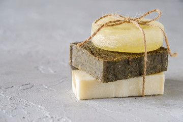 Bath and natural cosmetics concept.  Handmade soap bars on white table. Spa and body care