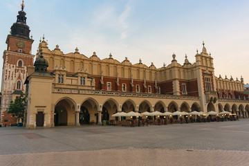 Fototapeta na wymiar Cloth Hall and Town Hall tower at Main Square (Rynek Główny), Krakow Old Town, Poland