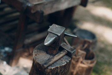 Blacksmith at work and tool