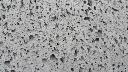 Grey color floor background with drak grey hole shapes