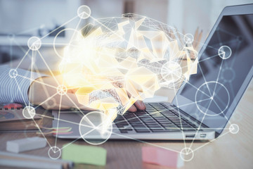 Man typing on keyboard background with brain hologram. Concept of big Data. Double exposure.
