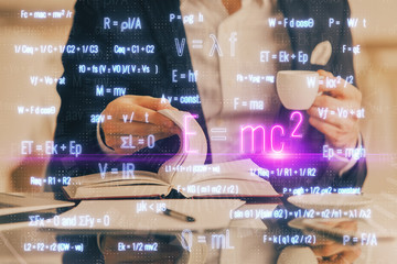 Student or teacher with mathematical and scientific formulas. Concepts of education.