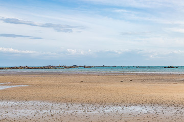 Fototapeta na wymiar A sandy beach on the island of Jersey, on a sunny summers day