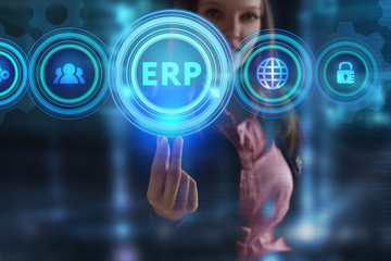 The concept of business, technology, the Internet and the network. A young entrepreneur working on a virtual screen of the future and sees the inscription: ERP