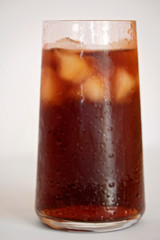 Iced Coffee Black with White Background. A delicious and refreshing beverage on a warm sunny day. Tasty, sweet, chilled, caffeine, smooth, yummy, drink.