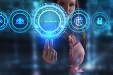 The concept of business, technology, the Internet and the network. A young entrepreneur working on a virtual screen of the future and sees the inscription: Cryptocurrency