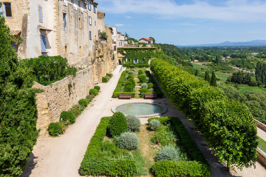 Lauris, France. 06-05-2019. Old houses and garden at  Lauris village in Provence, France.