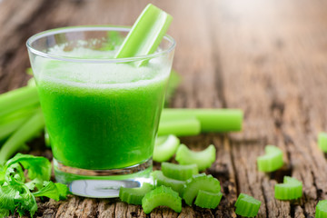 Fresh green celery juice in glass