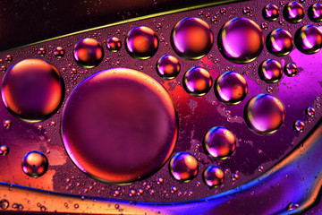 oil drops on a water surface abstract background. Art bubble