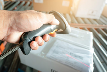 Workers Scanning Bar Code Scanner on Packaging Boxes. Shipping Warehouse. Computer Work Tools for...