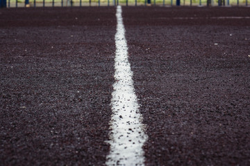 Obraz premium street football field. white stripe football pitch
