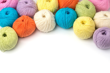 Colorful yarn balls isolated on white