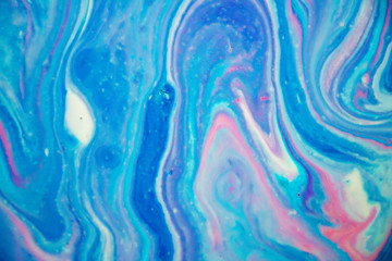 Abstract Purple, Blue and Pink Marbled Background and Texture. Beautiful colors, delicate swirls and interesting texture. Would make the perfect background for unicorn, mermaid or galaxy themes.