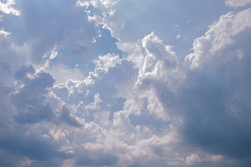 Fototapeta na wymiar clouds on a blue evening sky