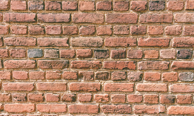 Aged brick wall background