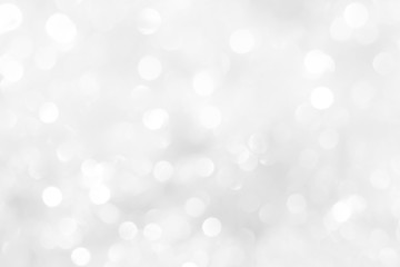 Plakat A brilliant white background with circles and ovals. Template for a holiday card with bright and sparkling lights.