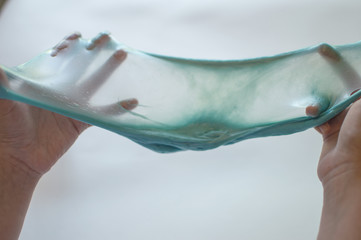 slimes in the hand of a child